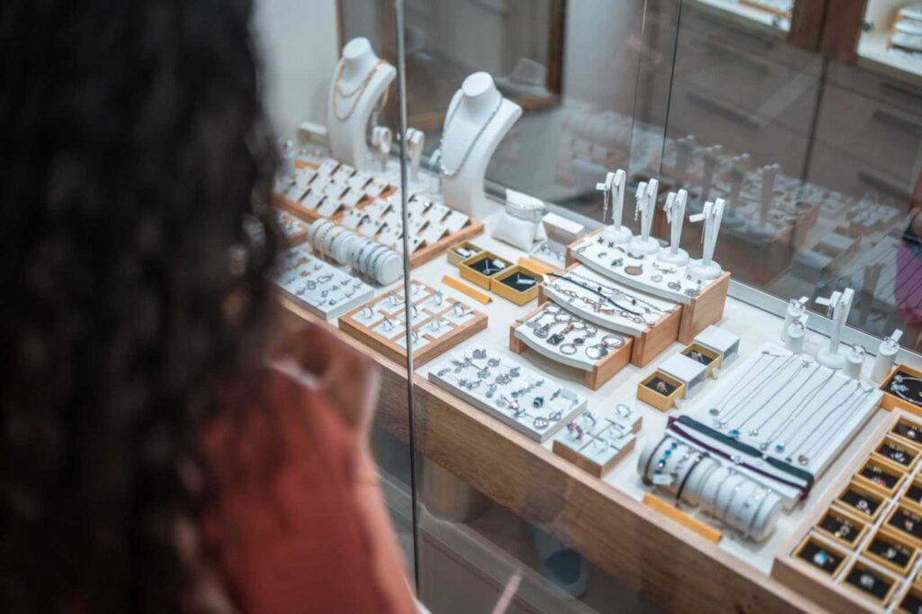 A woman looking at jewelry at pawn shop in Pleasant Hill, CA