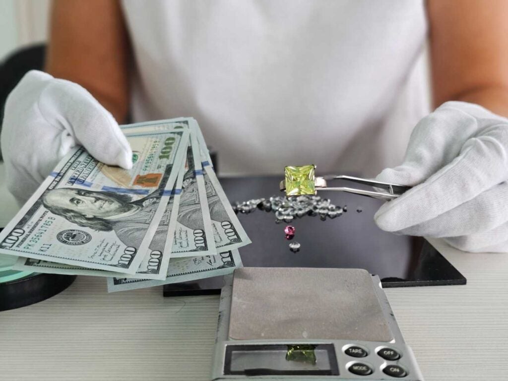 A pawn broker offering cash for diamond jewelry